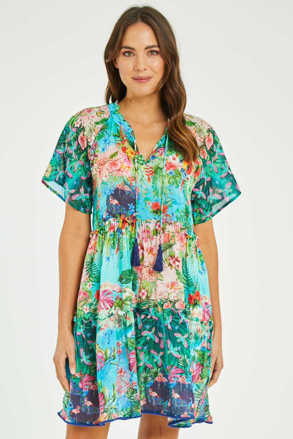 Model Madeline wearing size S of the Bonnie Dress in colour Print (Blue), from the front, cropped image