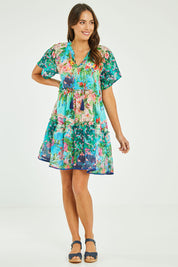 Model Madeline wearing size S of the Bonnie Dress in colour Print (Blue), from the front, showing the whole outfit