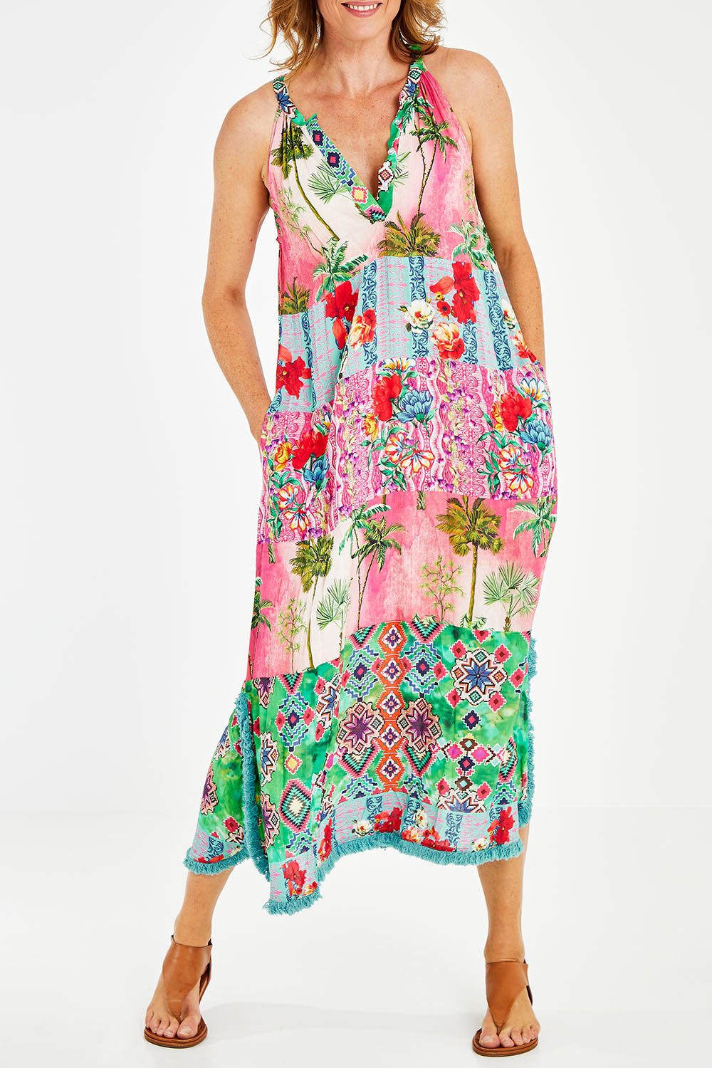 Model Naomi wearing size S of the California Maxi in colour Sunset (Pink), from the front, cropped image