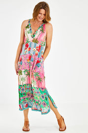 Model Naomi wearing size S of the California Maxi in colour Sunset (Pink), from the front, showing the whole outfit