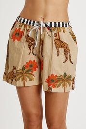 A model wearing the Congo Cotton Short in colour Natural, from the front, cropped image