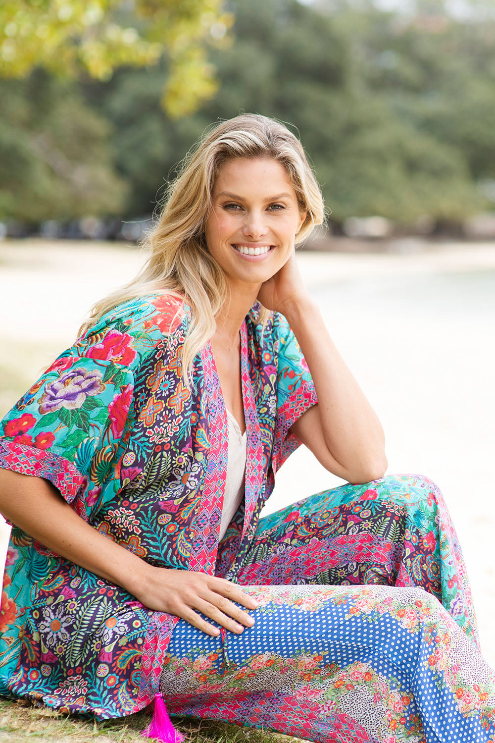 A model wearing the Darcy Kimono in colour Multi (Blue), from the front, showing the whole outfit
