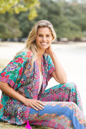 A model wearing the Darcy Kimono in colour Multi (Blue), from the front, showing the whole outfit