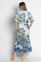 A model wearing the Dita Maxi Shirtdress in colour Ocean (Blue), from the back