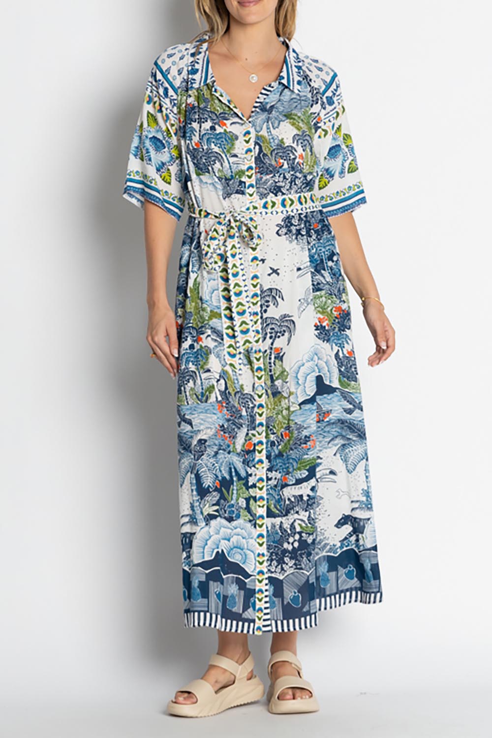 A model wearing the Dita Maxi Shirtdress in colour Ocean (Blue), from the front, cropped image