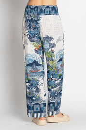 A model wearing the Dita Wide Leg Pant in colour Ocean (Blue), from the back