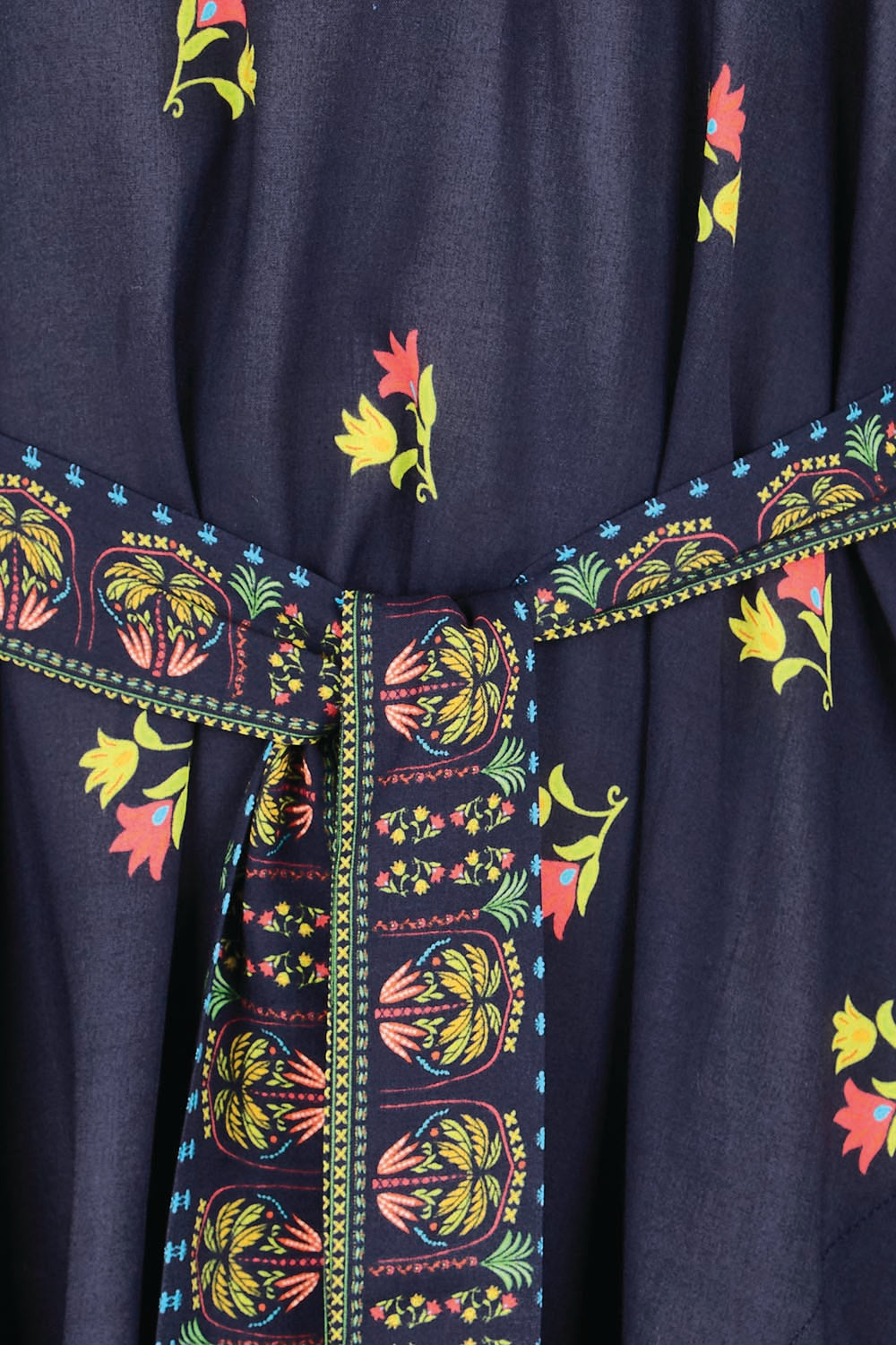 Product shot of the Emma Midi Dress – Ebony in colour Ebony, showing detail