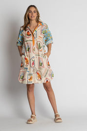A model wearing the Exotica Cotton Shirtmaker Dress in colour Multi, from the front, showing the whole outfit
