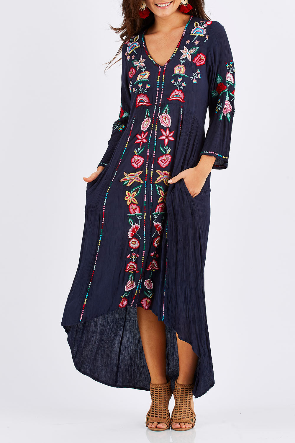 Model Chesska wearing size S of the Hayman Dress in colour Navy (Blue), from the front, cropped image