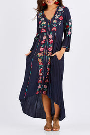 Model Chesska wearing size S of the Hayman Dress in colour Navy (Blue), from the front, cropped image