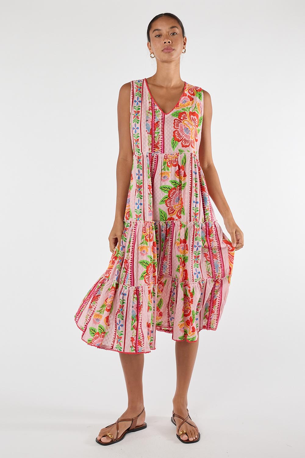 Model Genericm wearing size sample of the Ines Sleeveless Midi Dress – Shell in colour Shell, from the front