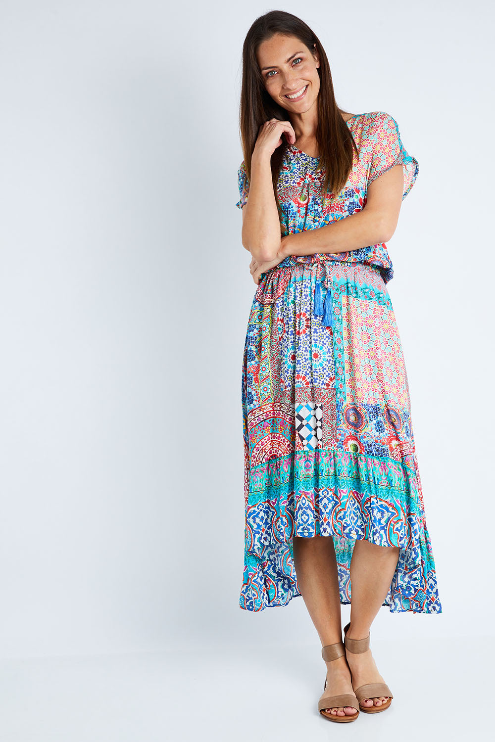 Model Anna wearing size S of the Isadora Dress in colour Print (Blue), from the front, showing the whole outfit
