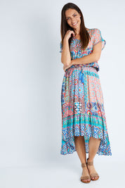 Model Anna wearing size S of the Isadora Dress in colour Print (Blue), from the front, showing the whole outfit