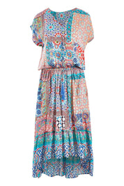 Product shot of the Isadora Dress in colour Print (Blue), from the front