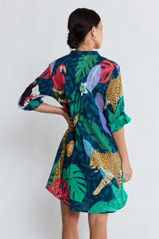 Model Genericm wearing size sample of the Jungle Fever Tuck Dress – Navy in colour Navy, from the back