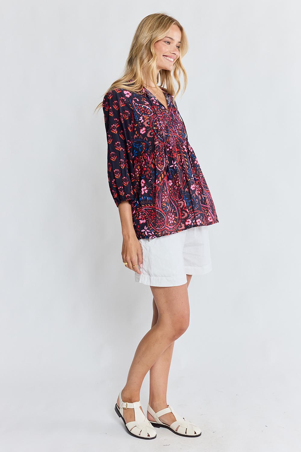 Model Genericm wearing size sample of the Kamila Top – Navy in colour Navy, from the front