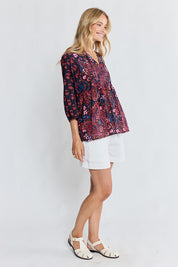 Model Genericm wearing size sample of the Kamila Top – Navy in colour Navy, from the front