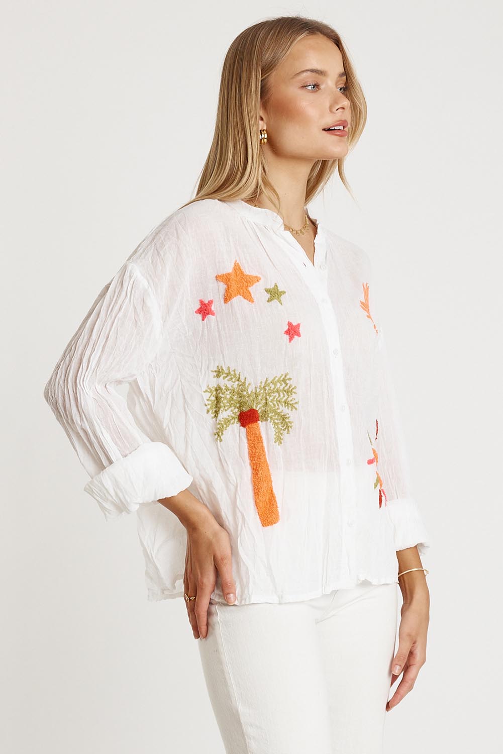 A model wearing the Keziah Cotton Shirt in colour White (White), from the front, cropped image