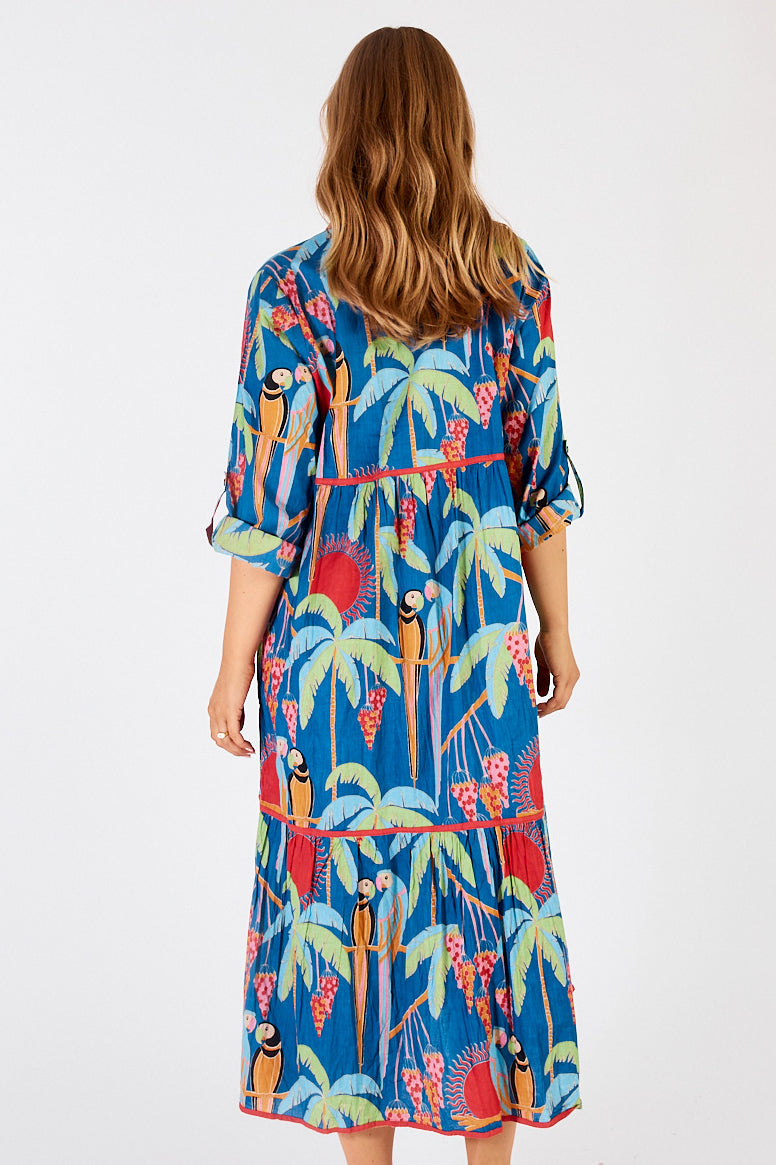 A model wearing the Lainie Midi Cotton Dress in colour Ocean (Blue), from the back