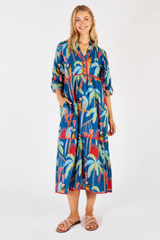 A model wearing the Lainie Midi Cotton Dress in colour Ocean (Blue), from the front, showing the whole outfit