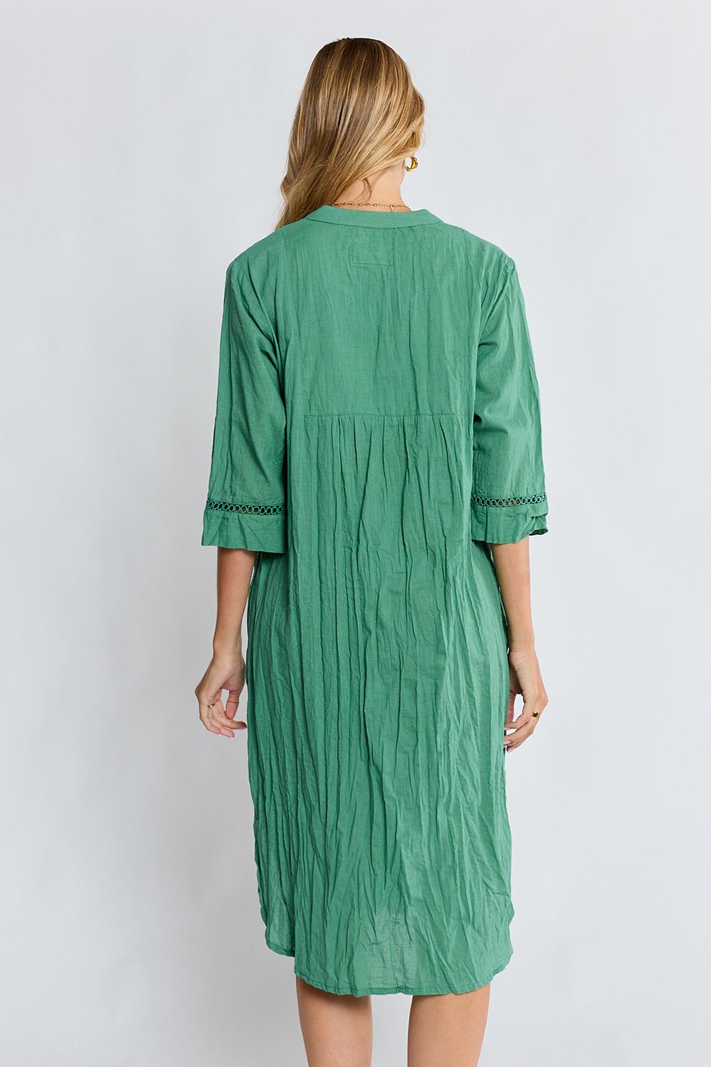 Model Genericm wearing size sample of the Laverne Kaftan Dress – Gumleaf in colour Gumleaf, from the back