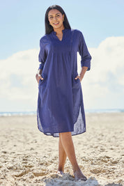 Model Eshan wearing size 10 of the Laverne Cotton Kaftan Dress – Navy in colour Navy, from the front