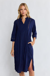 Model Genericm wearing size sample of the Laverne Kaftan Dress – Navy in colour Navy, from the front