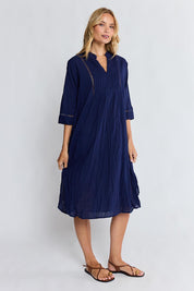 Model Genericm wearing size sample of the Laverne Kaftan Dress – Navy in colour Navy, from the front