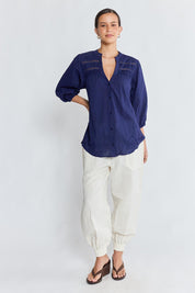 Model Genericm wearing size sample of the Laverne Tuck Shirt – Navy in colour Navy, from the front