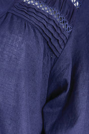 Product shot of the Laverne Tuck Shirt – Navy in colour Navy, showing detail
