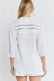Model Genericm wearing size sample of the Laverne Tuck Shirt – White in colour White, from the back