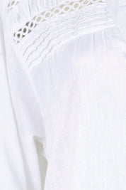 Product shot of the Laverne Tuck Shirt – White in colour White, showing detail