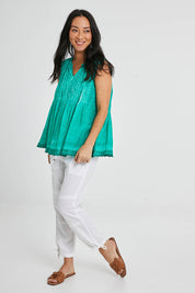 Model Katie wearing size S of the Leila Tank in colour Sea (Green), from the front, showing the whole outfit