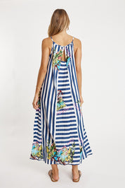 A model wearing the Lucciano Cotton Maxi Dress in colour Navy (Blue), from the back