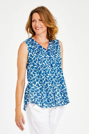Model Naomi wearing size S of the Marley Top in colour Ocean (Blue), from the front, cropped image