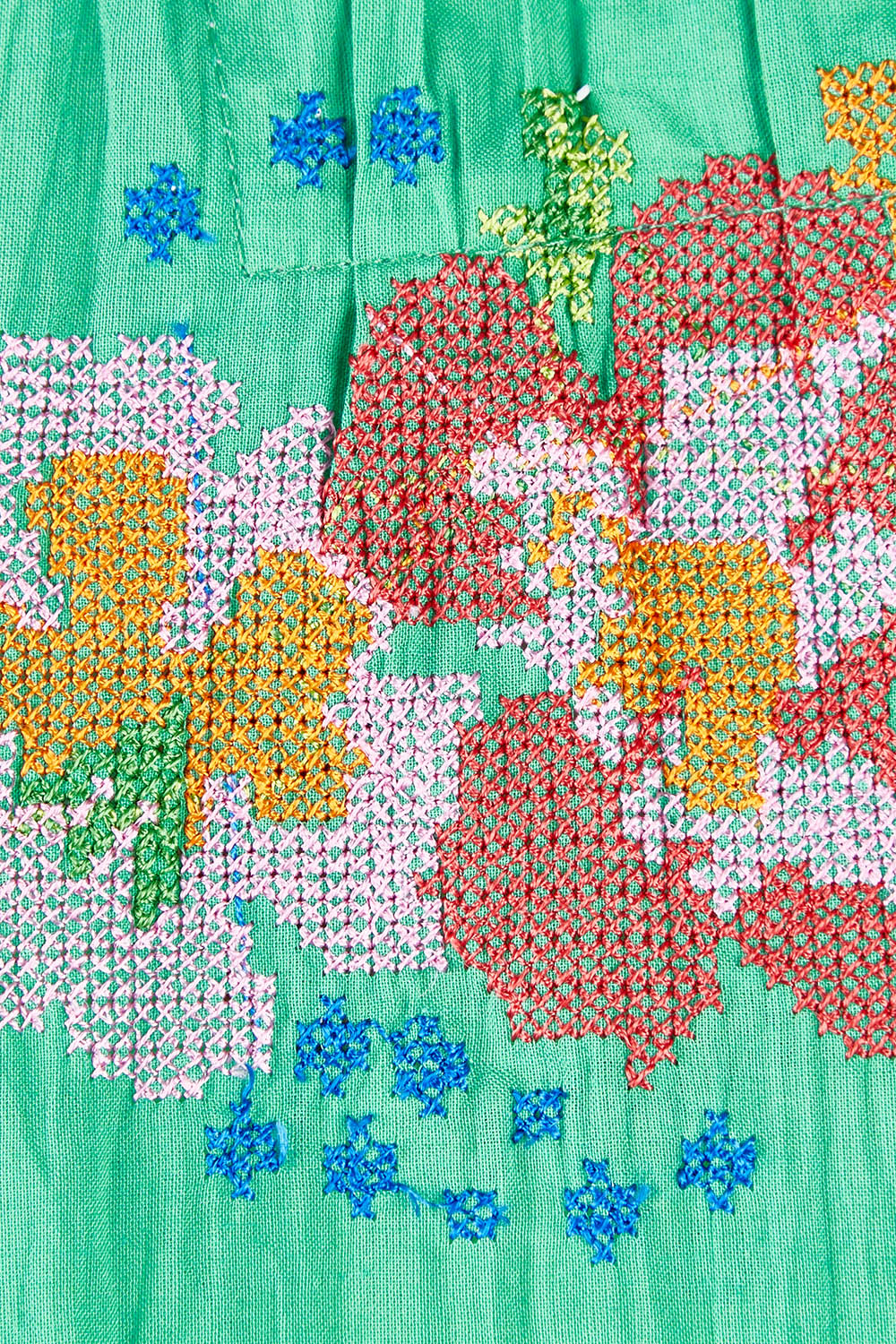 Product shot of the Mermaid Top in colour Sea (Green), detail
