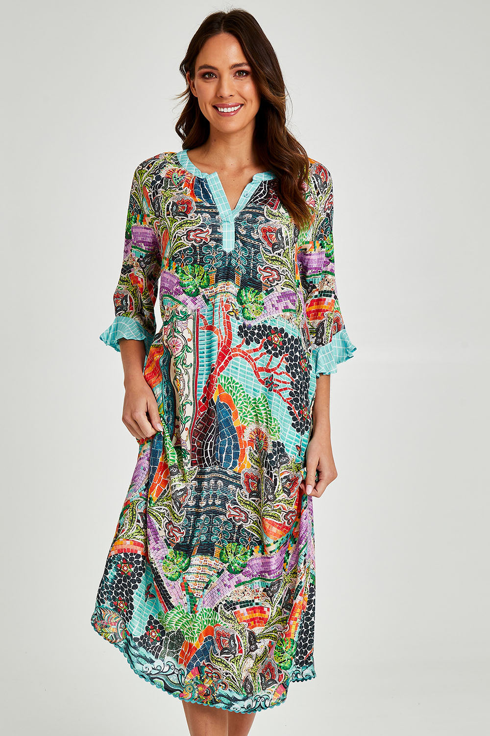 Model Madeline wearing size S of the Mosaic Maxi Dress in colour Print (Blue), from the front, cropped image