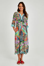 Model Madeline wearing size S of the Mosaic Maxi Dress in colour Print (Blue), from the front, showing the whole outfit