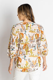 A model wearing the Prairie Cotton Shirt in colour White, from the back