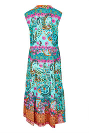 Product shot of the Ratana Cotton Midi Dress in colour Lagoon (Blue), from the back