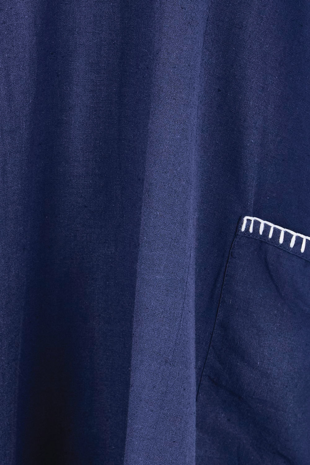 Product shot of the Remi Dress – Navy in colour Navy, showing detail