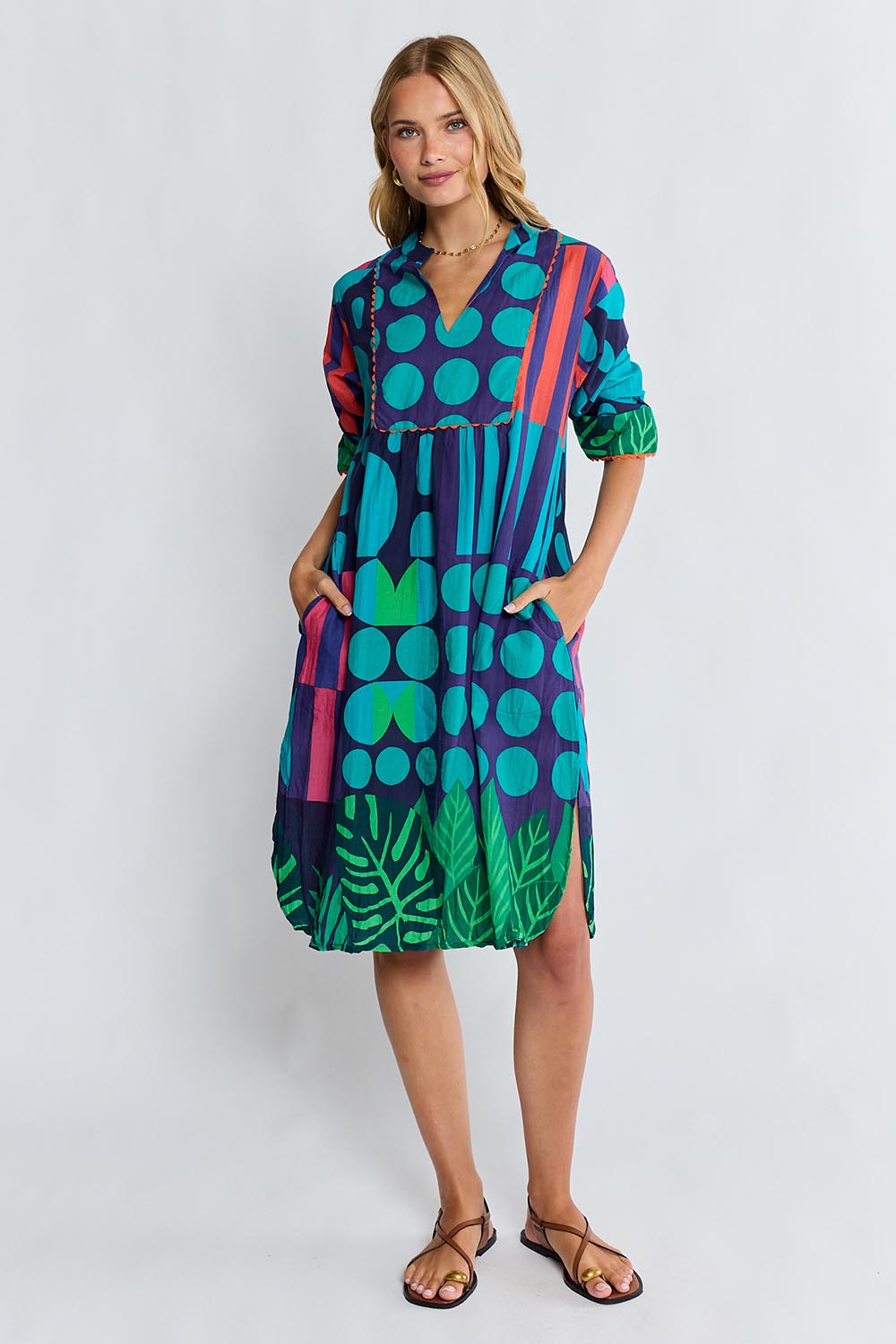 Model Genericm wearing size sample of the Rhea Midi Dress – Navy in colour Navy, from the front