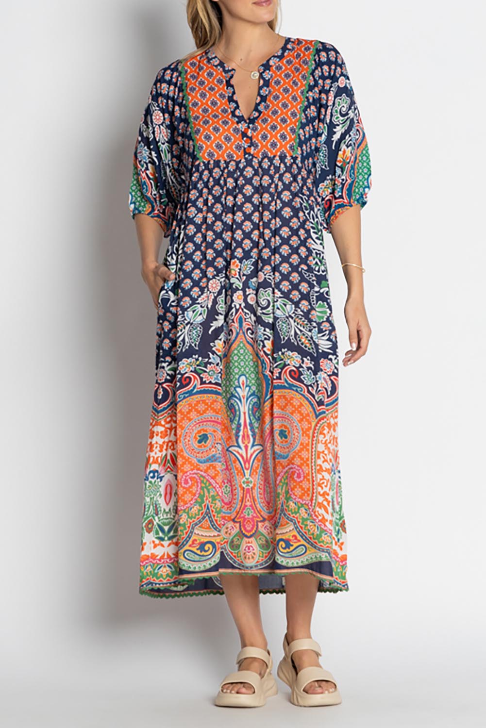 A model wearing the Sarah Midi Dress in colour Navy (Blue), from the front, cropped image