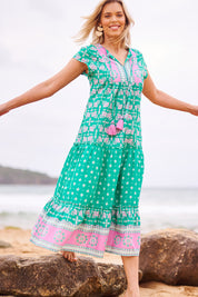 Model Phoebe wearing size S of the Scarlet Cotton Maxi Dress in colour Sea (Green), from the front, showing the whole outfit