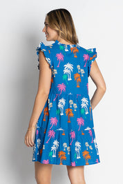 A model wearing the Shamira Cotton Dress in colour Navy (Blue), from the back