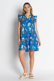 A model wearing the Shamira Cotton Dress in colour Navy (Blue), from the front, showing the whole outfit