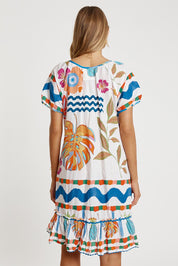 A model wearing the Tasmin Shirred Cotton Dress in colour White (White), from the back