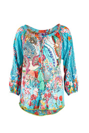 Product shot of the Tyra Top in colour Print (Blue), from the front