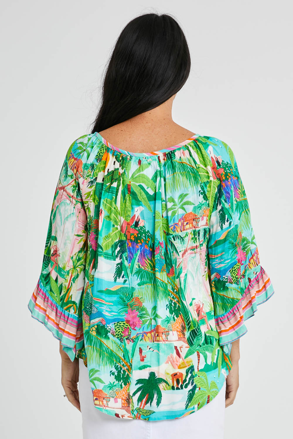 Model Katie wearing size S of the Vacation Top in colour Print (Green), from the back