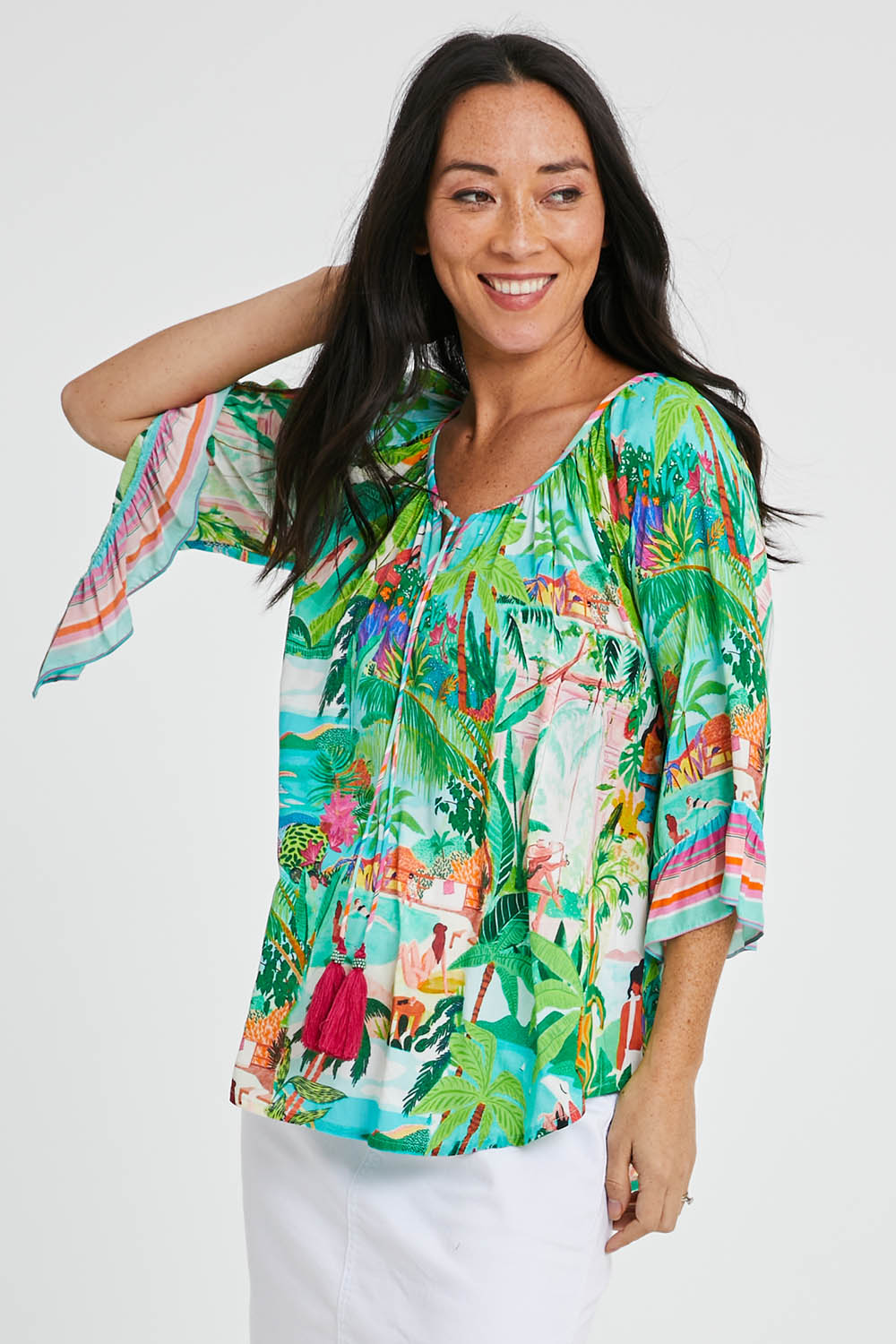 Model Katie wearing size S of the Vacation Top in colour Print (Green), from the front, cropped image